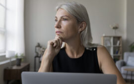 Woman thinking about financial mistakes during divorce